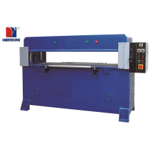 Auto-feeding hydraulic press cutting machine for clamshell